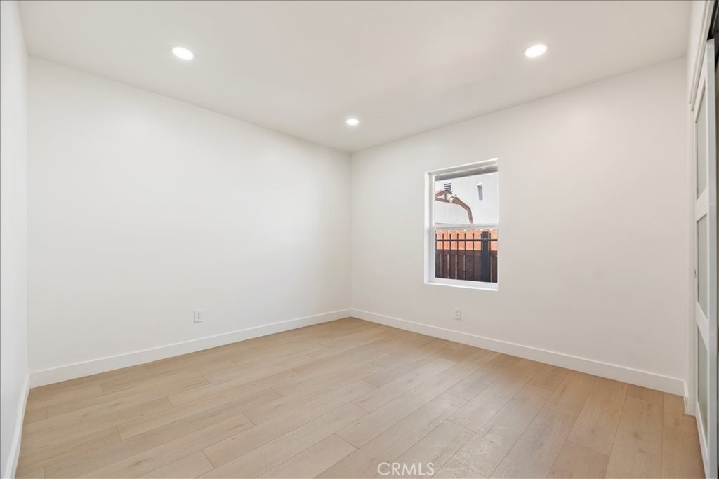 3011 5th Los Angeles, CA 90018 - Photo 27 of 44 an empty room with a window