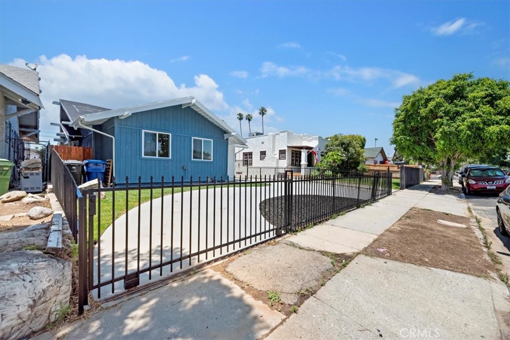 3011 5th Los Angeles, CA 90018 - Photo 3 of 44 a view of a brick house with a street view