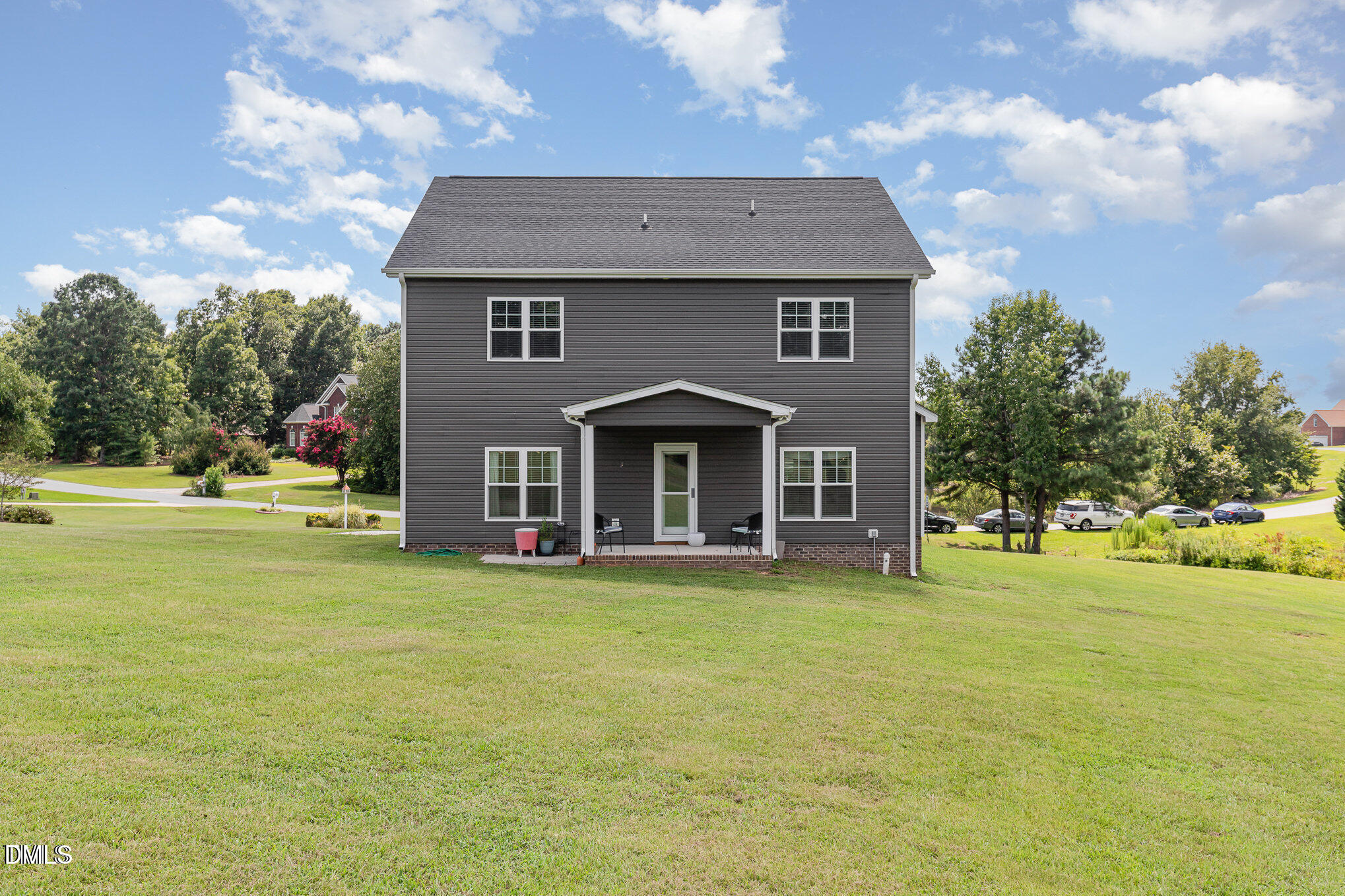 8662 Buckhorn Plantation Road Sims, NC 27880 - Photo 24 of 37 a front view of a house with a yard