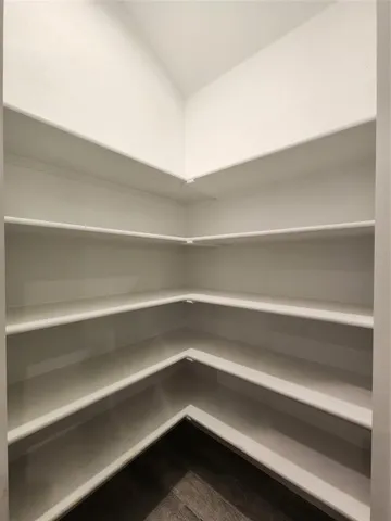 a view of small space with racks on the wall