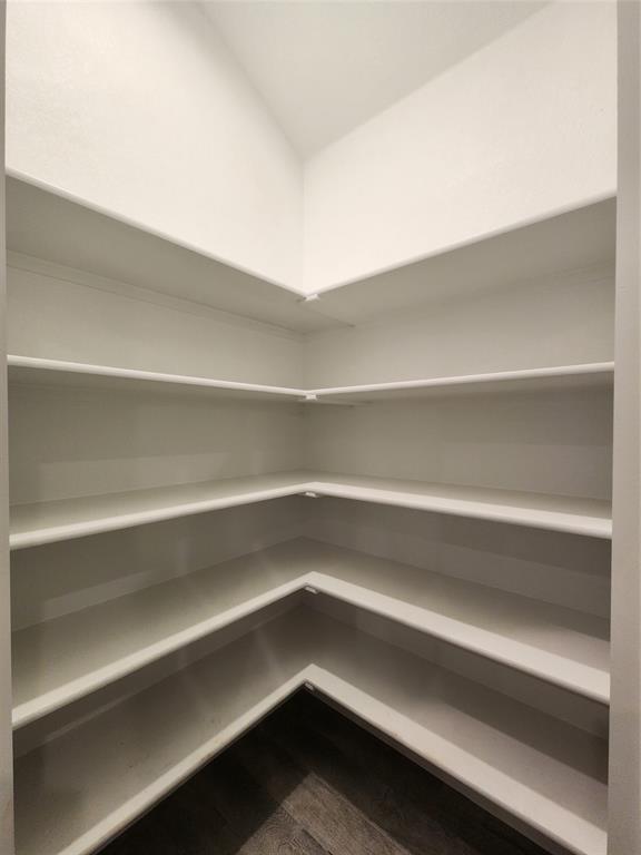 1521 Razorbill Road Denton, TX 76205 - Photo 13 of 31 a view of small space with racks on the wall