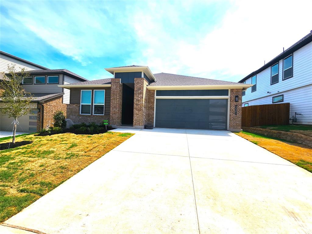1521 Razorbill Road Denton, TX 76205 - Photo 27 of 31 a house view with swimming pool