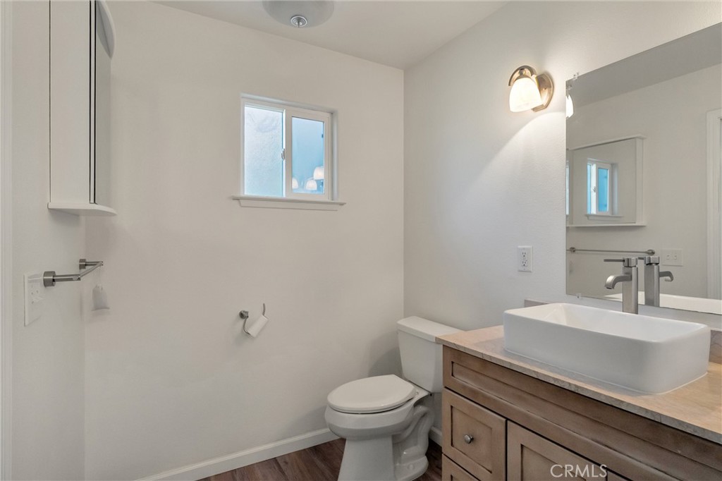 1394 Wagstaff Road Paradise, CA 95969 - Photo 20 of 46 a bathroom with a sink toilet and a mirror