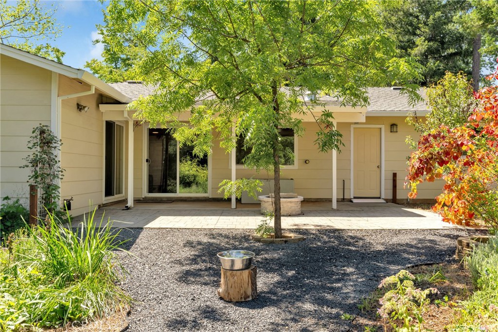 1394 Wagstaff Road Paradise, CA 95969 - Photo 32 of 46 a front view of a house with garden