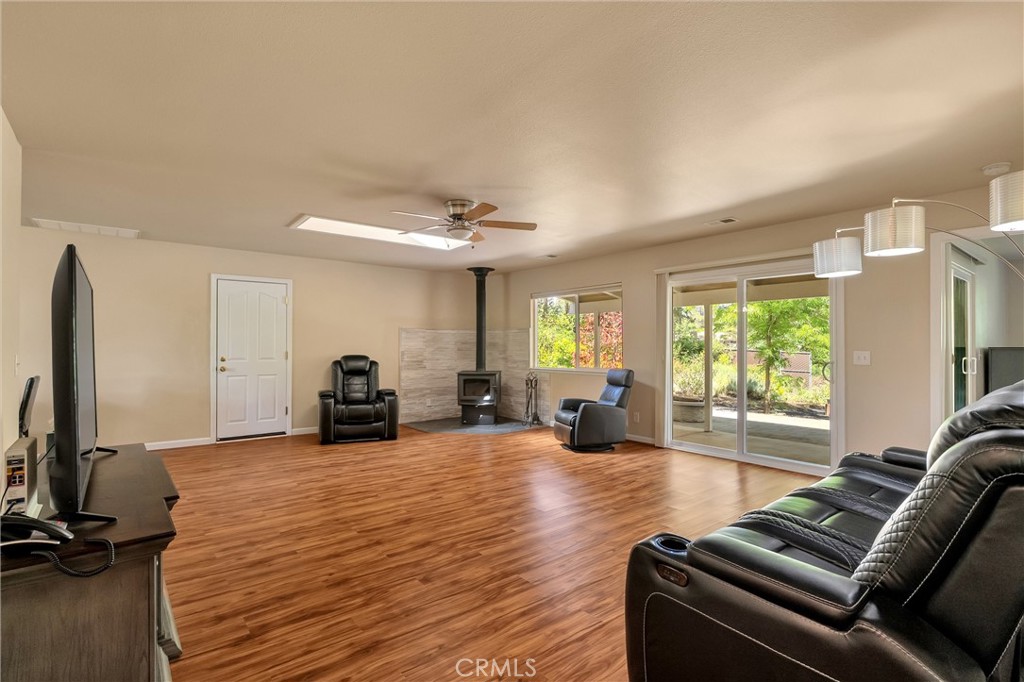 1394 Wagstaff Road Paradise, CA 95969 - Photo 4 of 46 a view of a livingroom with furniture hardwood floor and a large window
