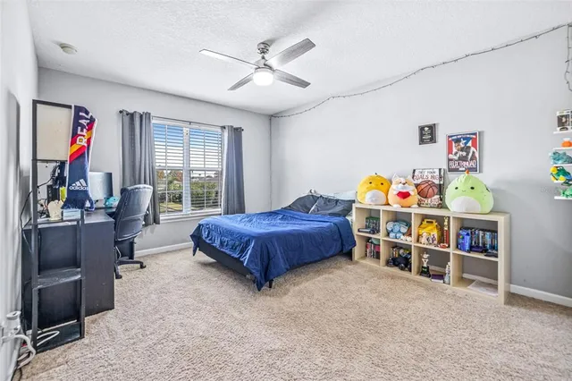 a bedroom with furniture and a bed