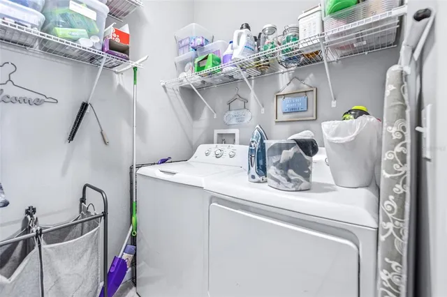 a utility room with dryer and washer
