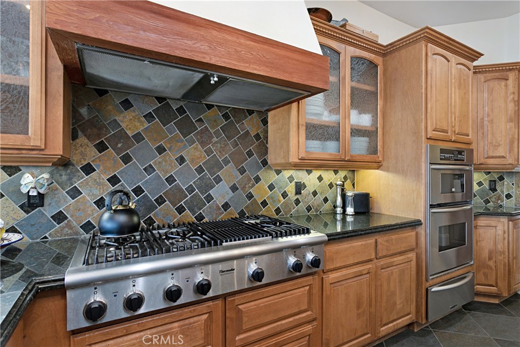 4106 Rock Mountain Road Fallbrook, CA 92028 - Photo 14 of 36 a close view of stove top oven