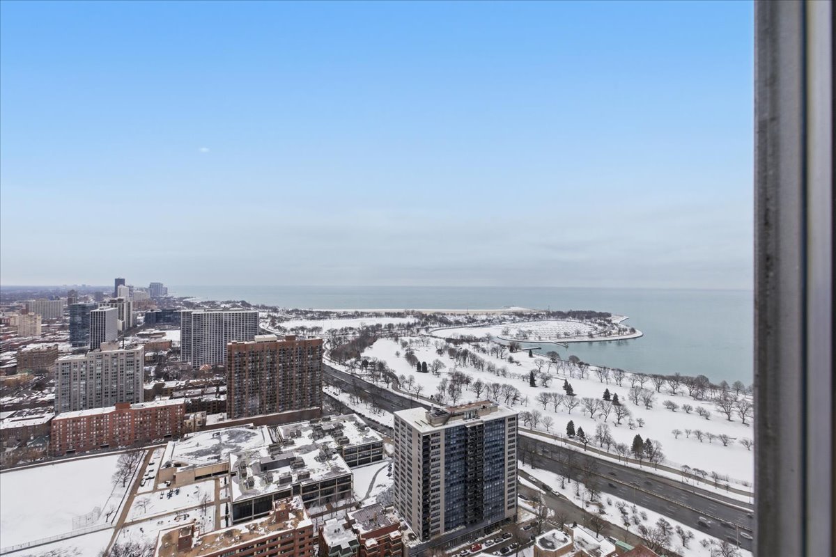 655 West Irving Park Road, Unit 4412 Chicago, IL 60613 - Photo 8 of 19 a city view with tall buildings