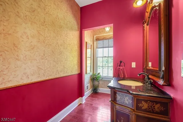 a room with furniture and a mirror