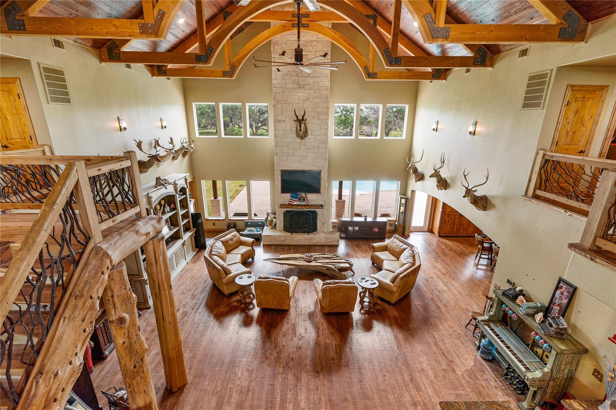 8821 FM 524 Road Sweeny, TX 77480 - Photo 11 of 47 a living room with fireplace furniture and a wooden floor