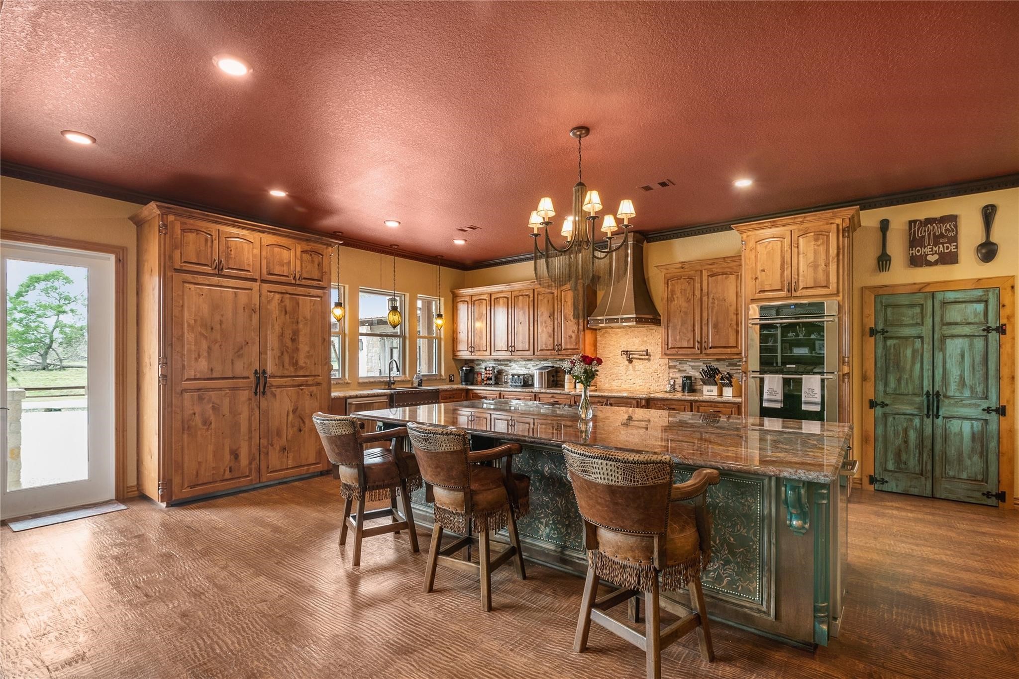 8821 FM 524 Road Sweeny, TX 77480 - Photo 16 of 47 a large kitchen with a table and chairs