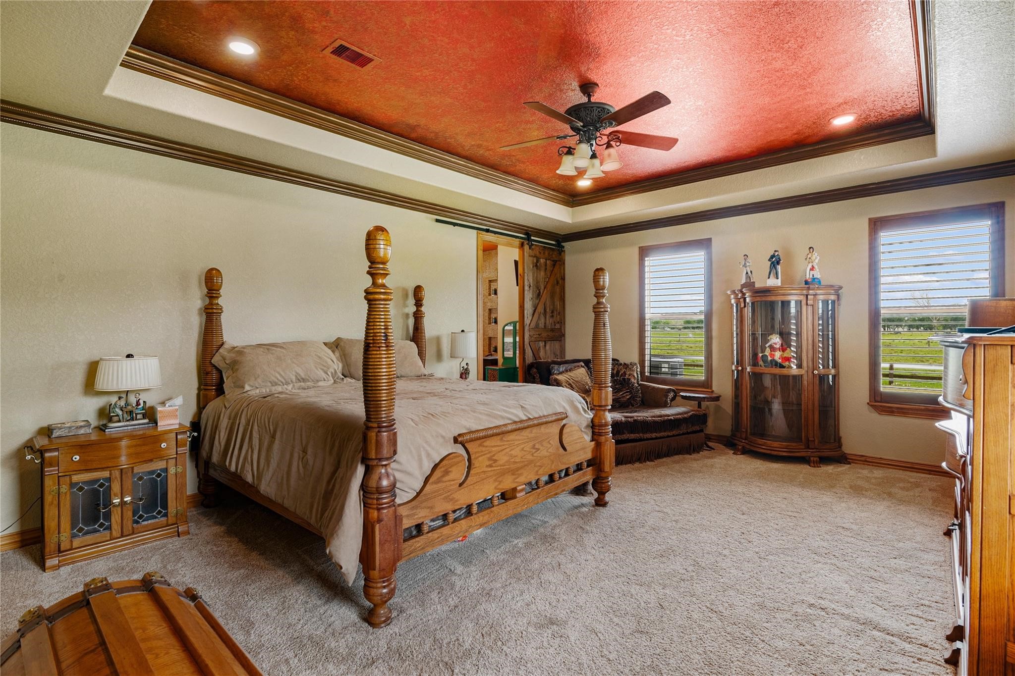 8821 FM 524 Road Sweeny, TX 77480 - Photo 26 of 47 a bed room with a bed and a ceiling fan