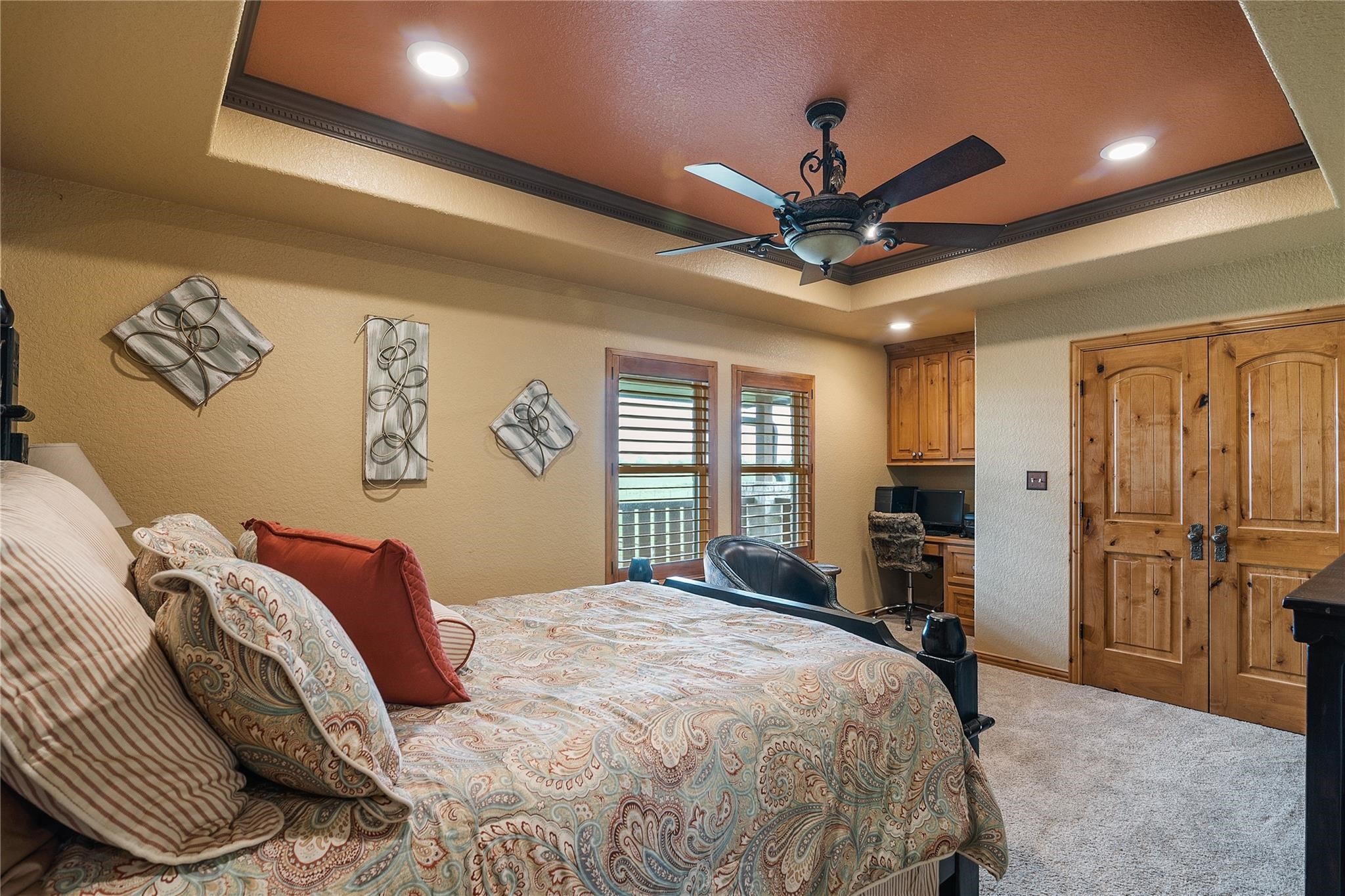 8821 FM 524 Road Sweeny, TX 77480 - Photo 30 of 47 a bedroom with a large bed and a chandelier