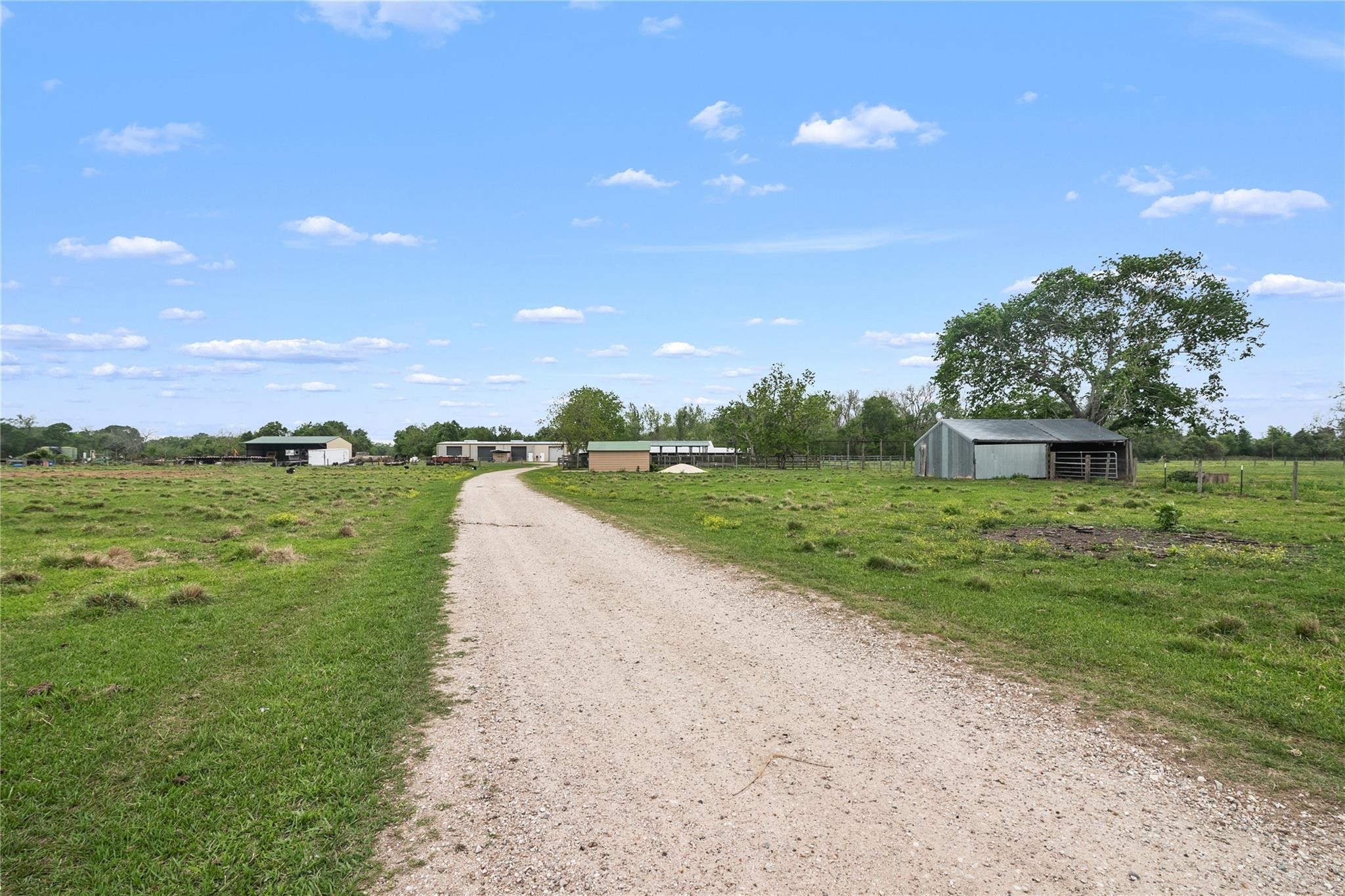 8821 FM 524 Road Sweeny, TX 77480 - Photo 44 of 47 a view of a garden with a lake