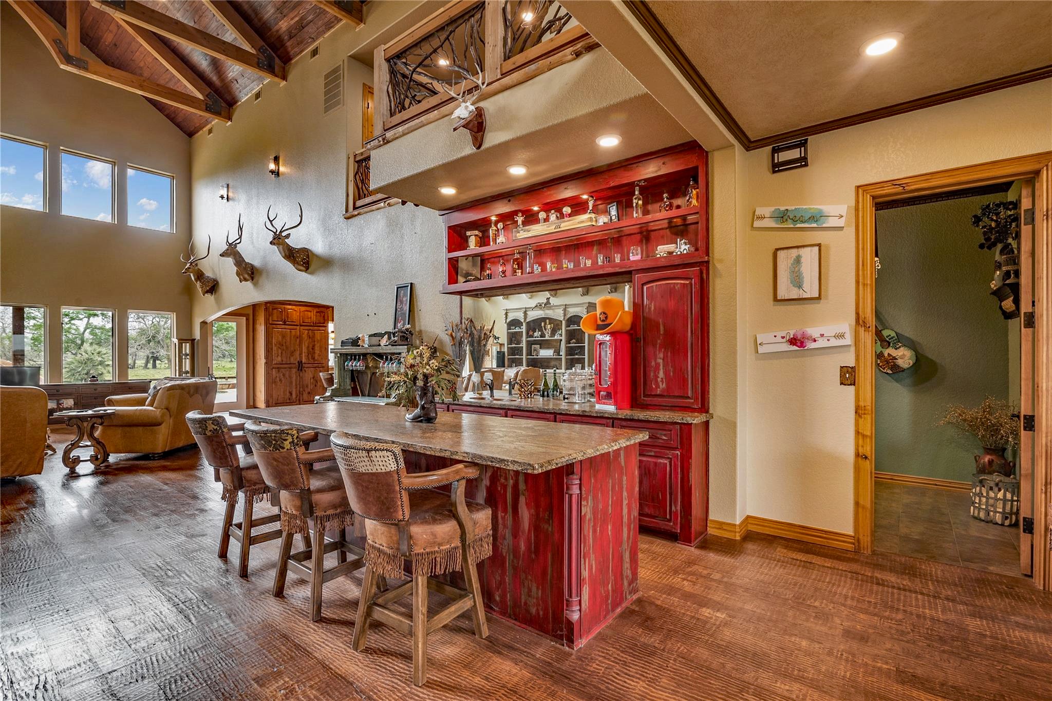 8821 FM 524 Road Sweeny, TX 77480 - Photo 9 of 47 a dining hall with stainless steel appliances kitchen island granite countertop furniture and a fireplace