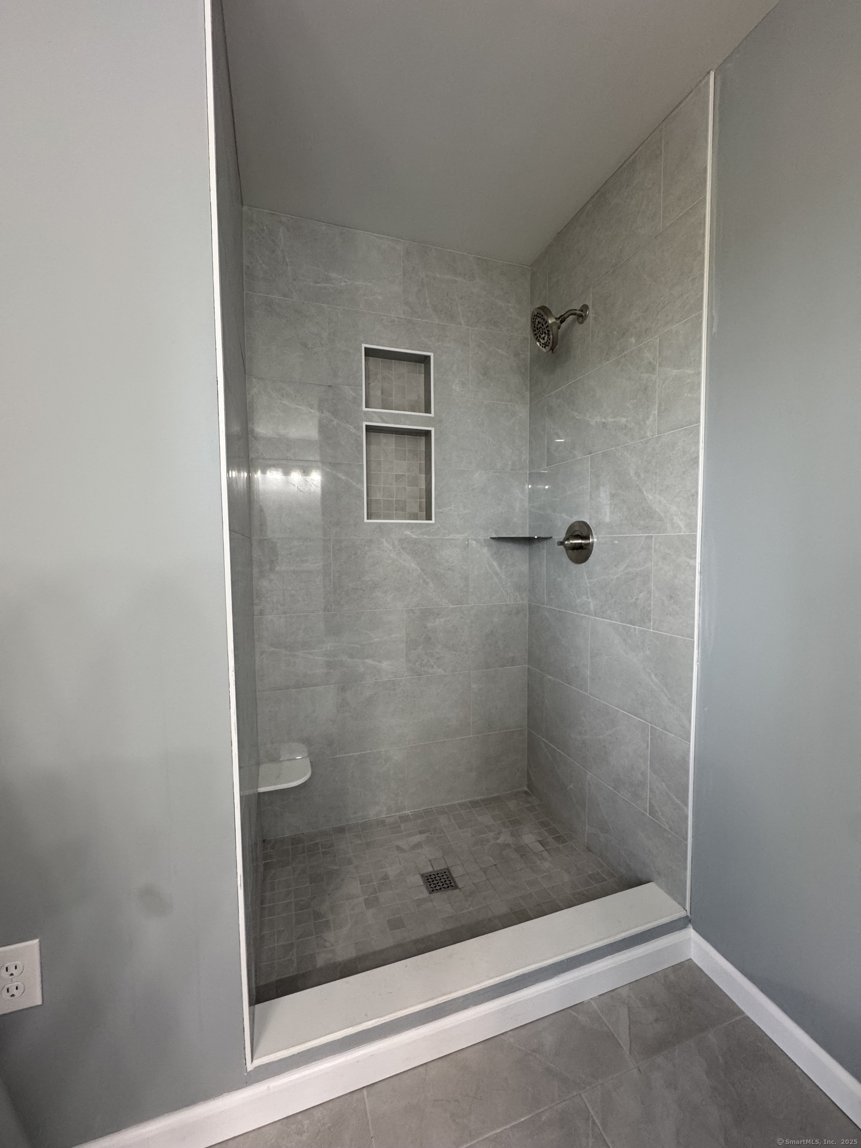 274 Riverside Drive Meriden, CT 06451 - Photo 4 of 7 a bathroom with a glass shower door