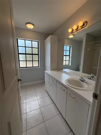a bathroom with a tub and a shower