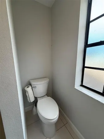 a utility room with sink dryer and washer