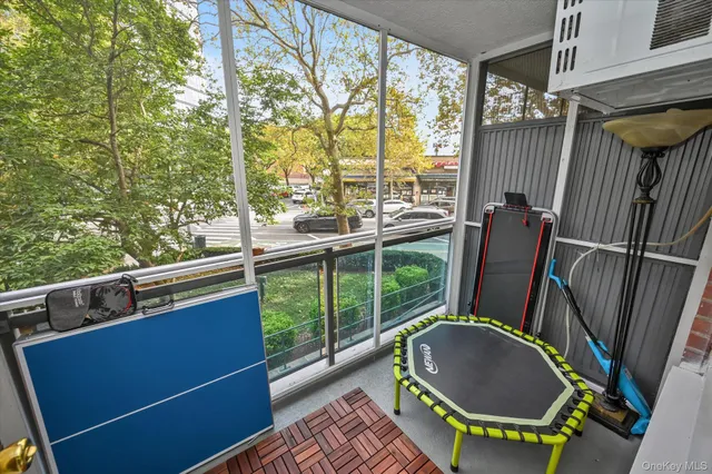 a bathroom with a toilet a sink and a mirror