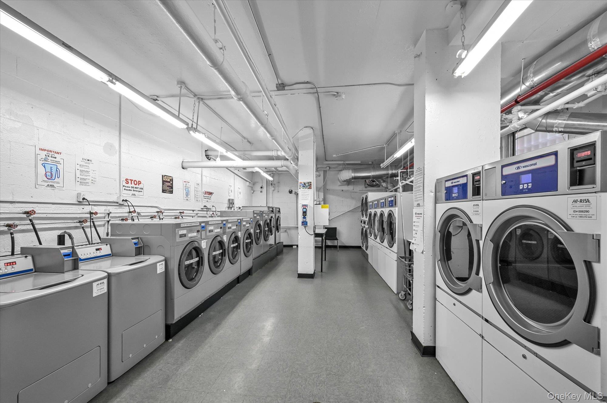 97-37 63rd Road, Unit 2J Queens, NY 11374 - Photo 19 of 19 a utility room with dryer and washer