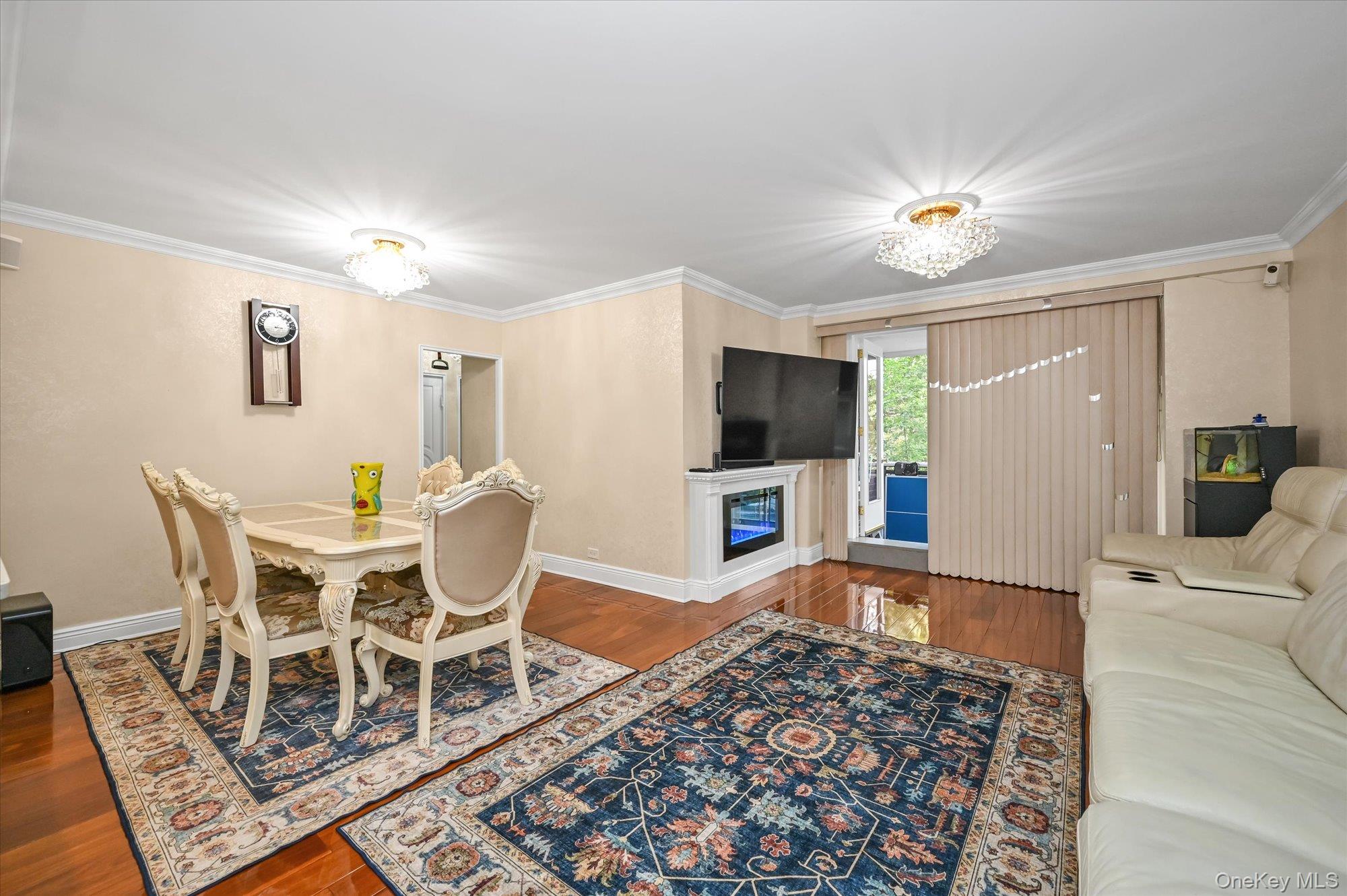 97-37 63rd Road, Unit 2J Queens, NY 11374 - Photo 4 of 19 a view of a dining room with furniture