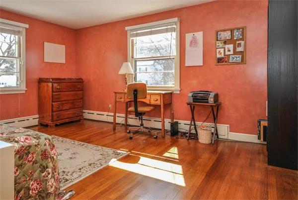36 Hunting Road Needham, MA 02494 - Photo 5 of 11 a living room with furniture a dining table with wooden floor and next to windows