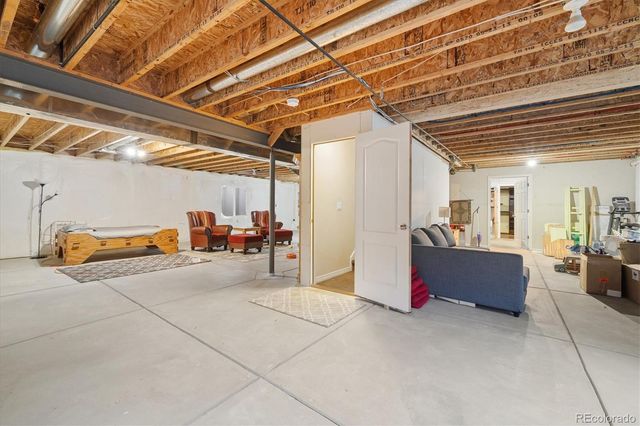 a view of storage and utility room with furniture