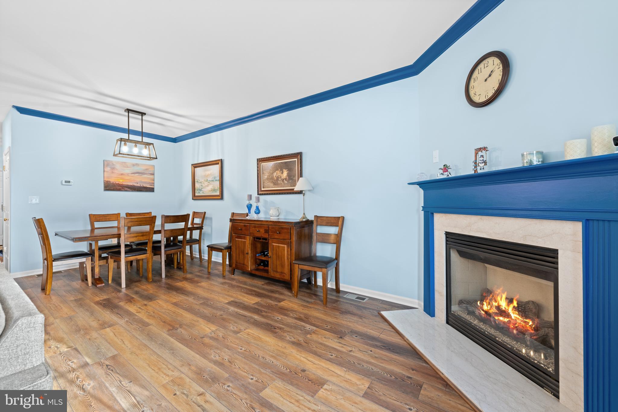 493 Buchanan Road Perkasie, PA 18944 - Photo 12 of 33 a living room with furniture a fireplace a clock and a window
