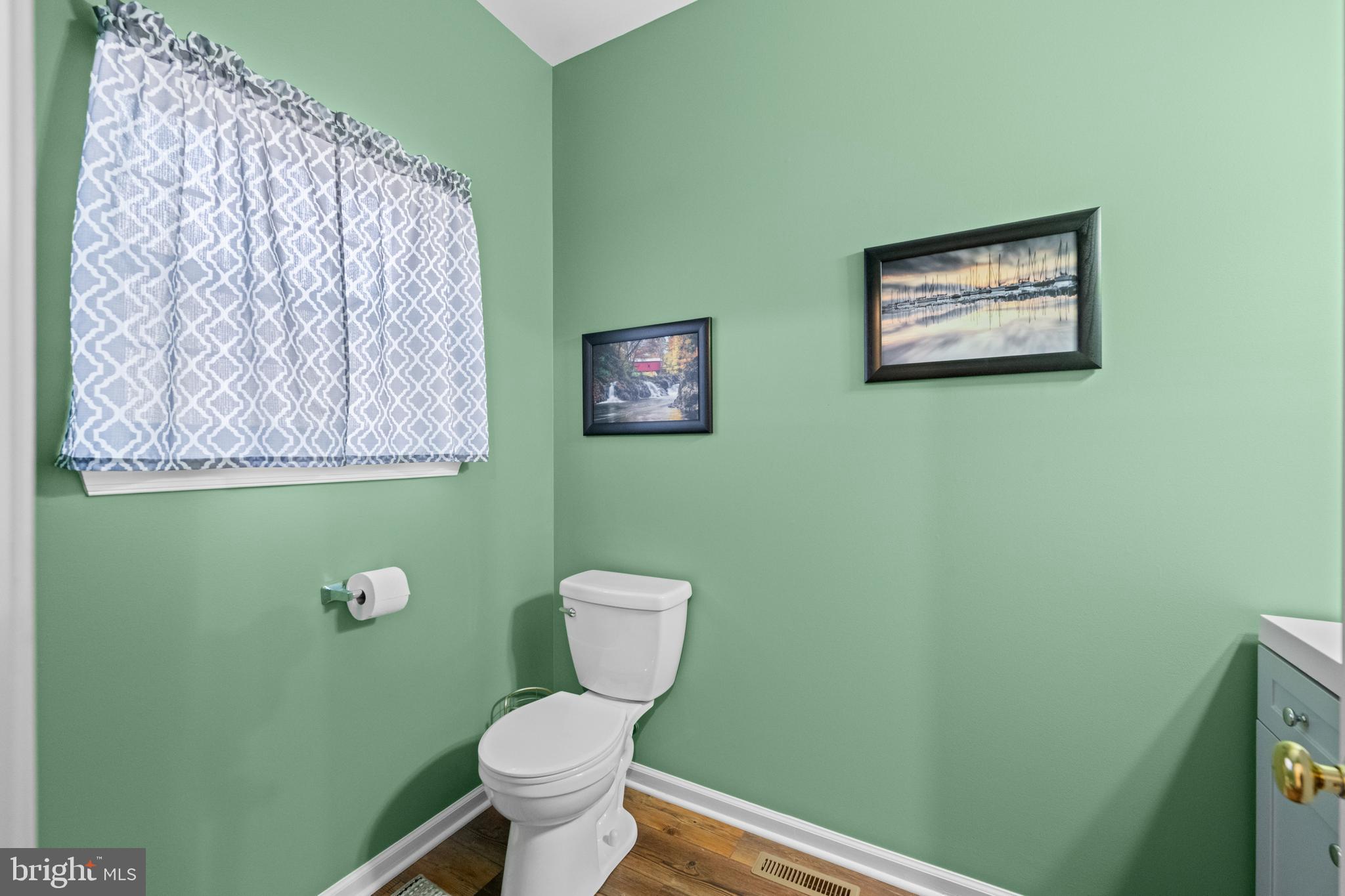 493 Buchanan Road Perkasie, PA 18944 - Photo 14 of 33 a bathroom with a toilet and a sink