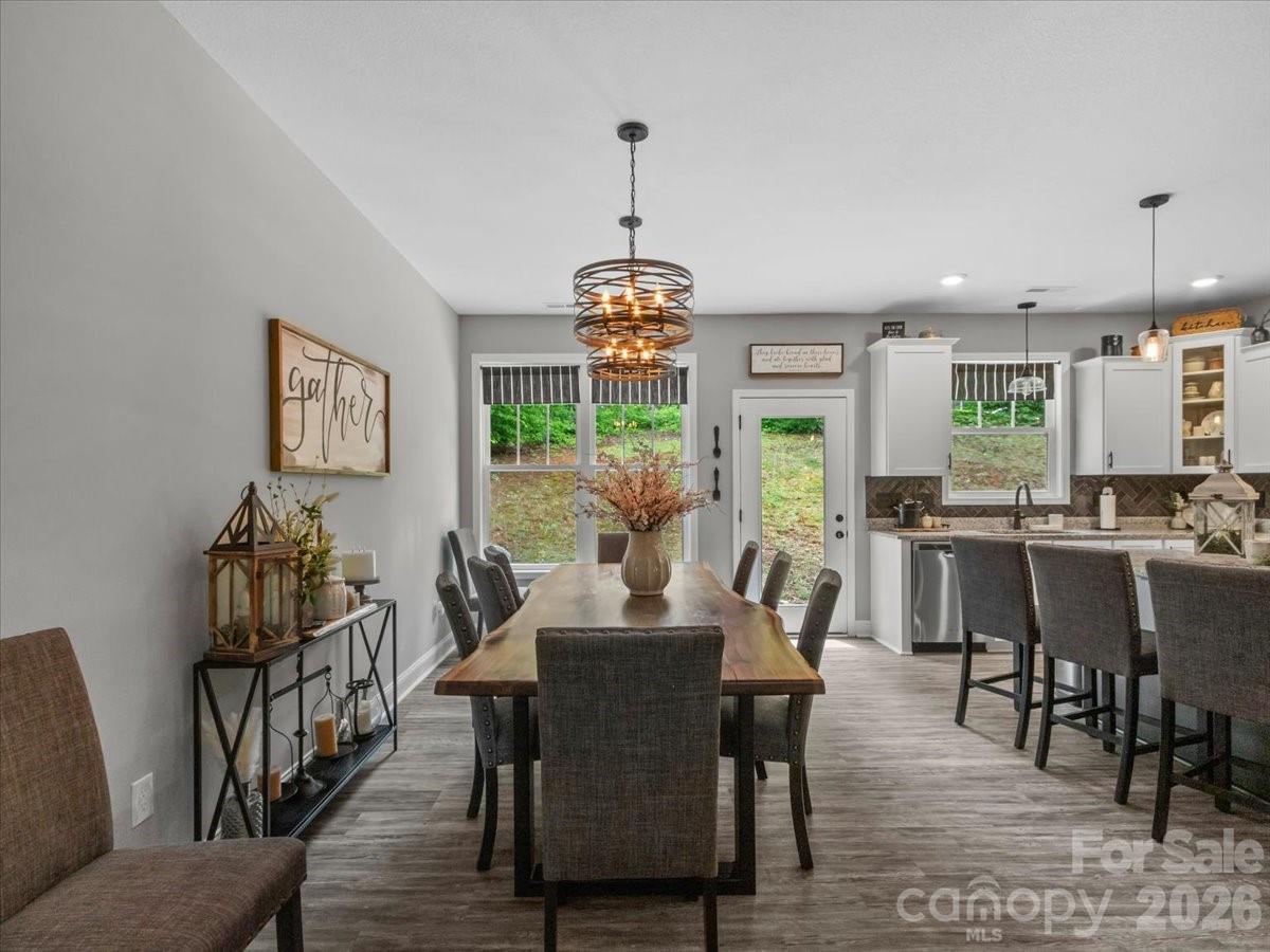 36 Cherry Ridge Lane Weaverville, NC 28787 - Photo 13 of 37 a dining room with furniture a chandelier and window