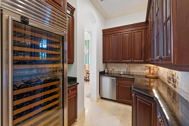 a view of a chairs and table in a balcony