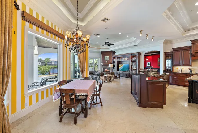 a view of a dinning table and chairs in the patio
