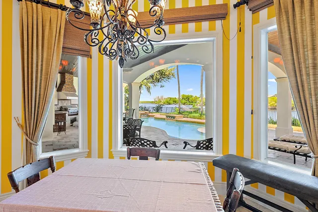 a bed room with a bed and a chair