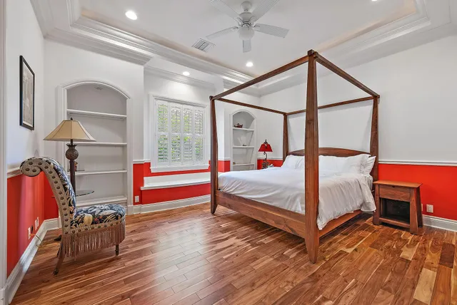 a front view of multiple houses with yard