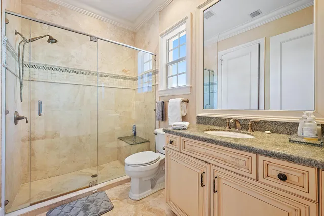 a front view of a house with a yard table and chairs