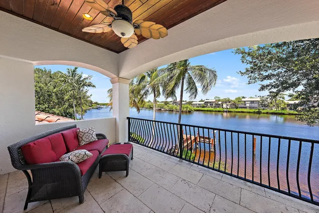 a view of a house with a tree