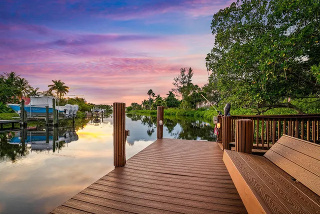 an aerial view of lake residential house with outdoor space