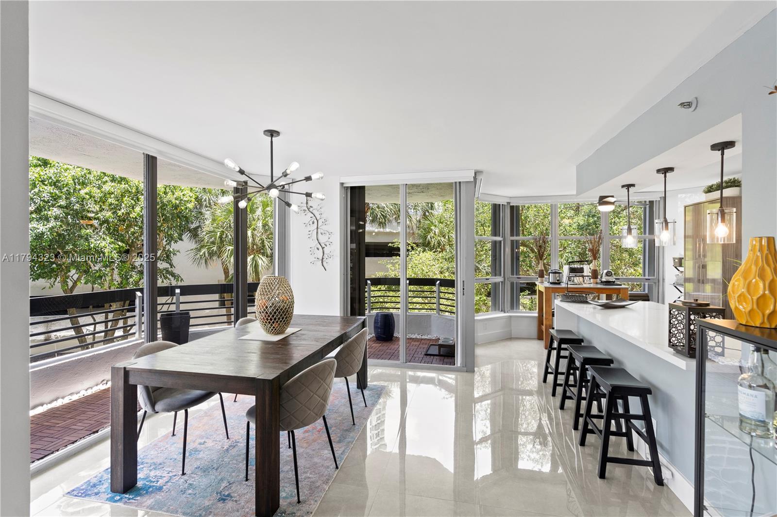3600 Mystic Pointe Drive, Unit 306 Aventura, FL 33180 - Photo 16 of 52 a view of a dining room with furniture window and outside view