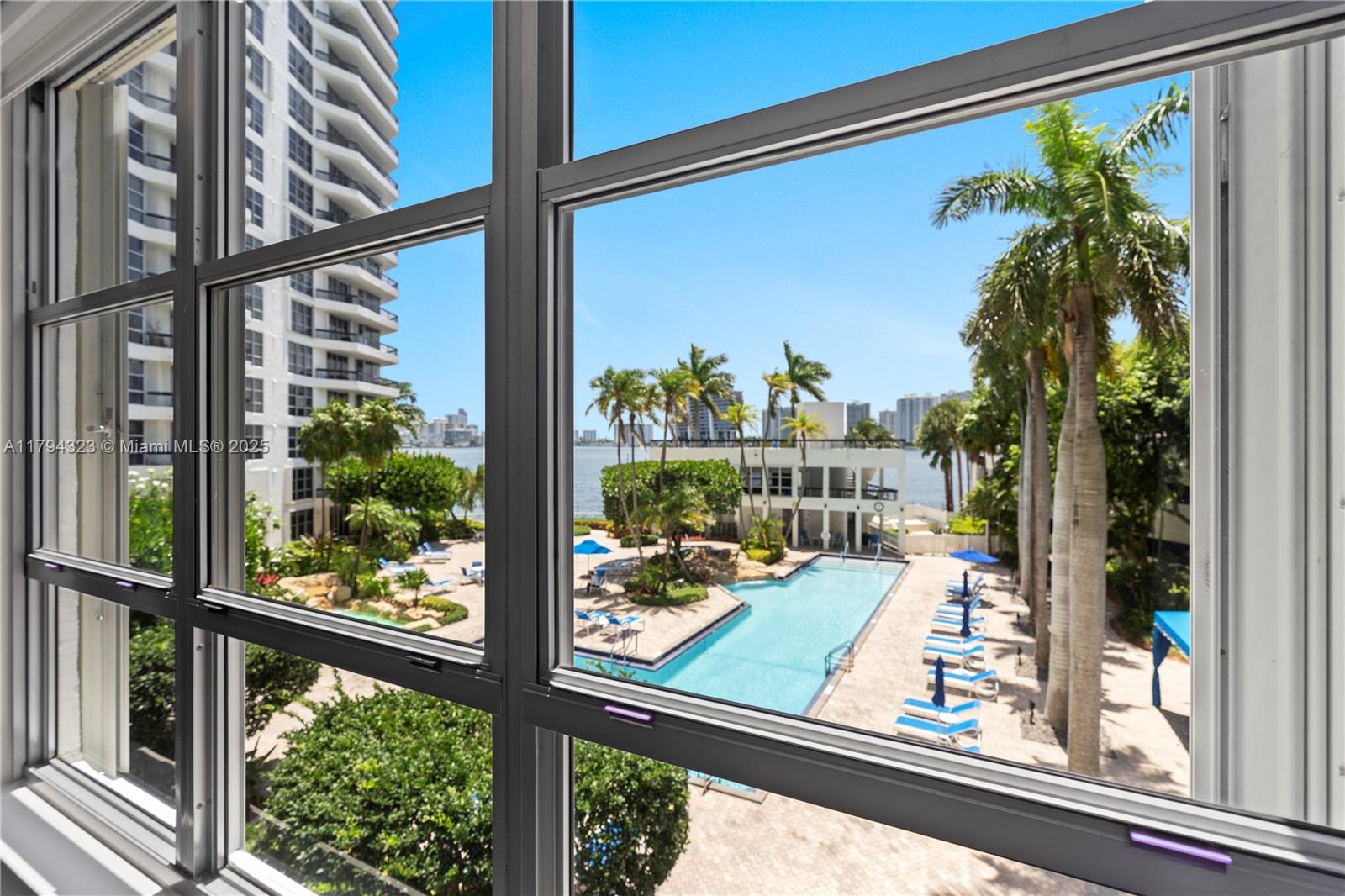 3600 Mystic Pointe Drive, Unit 306 Aventura, FL 33180 - Photo 18 of 52 a view of a city from a window