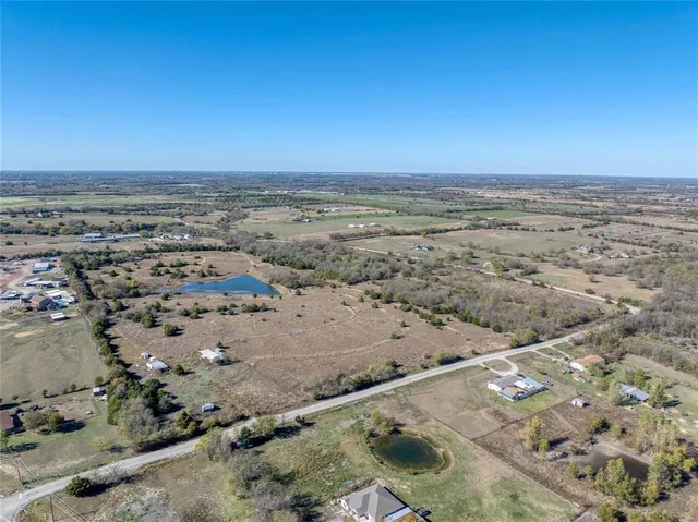an aerial view of beach and city