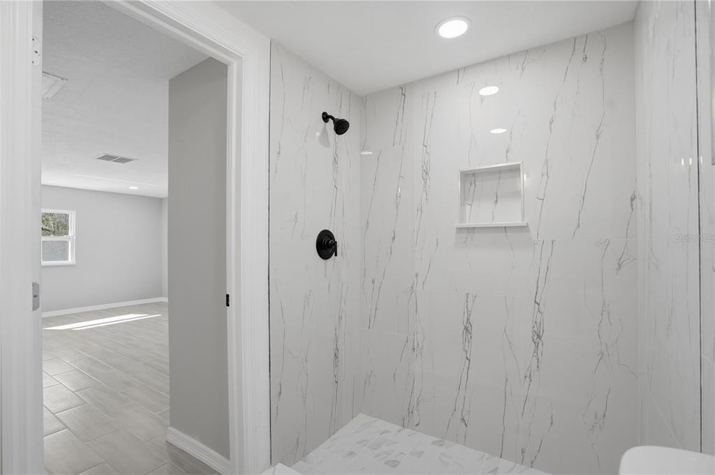 5543 Quist Drive Port Richey, FL 34668 - Photo 15 of 21 a view of bathroom with shower