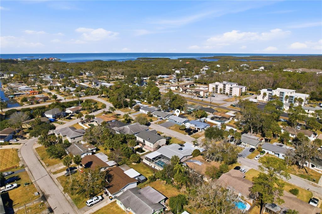 5543 Quist Drive Port Richey, FL 34668 - Photo 18 of 21 an aerial view of residential building with parking space