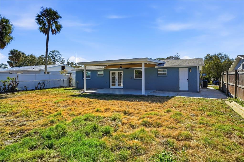 5543 Quist Drive Port Richey, FL 34668 - Photo 21 of 21 a house view with a garden space