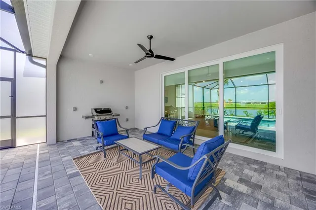 a view of a swimming pool with a patio