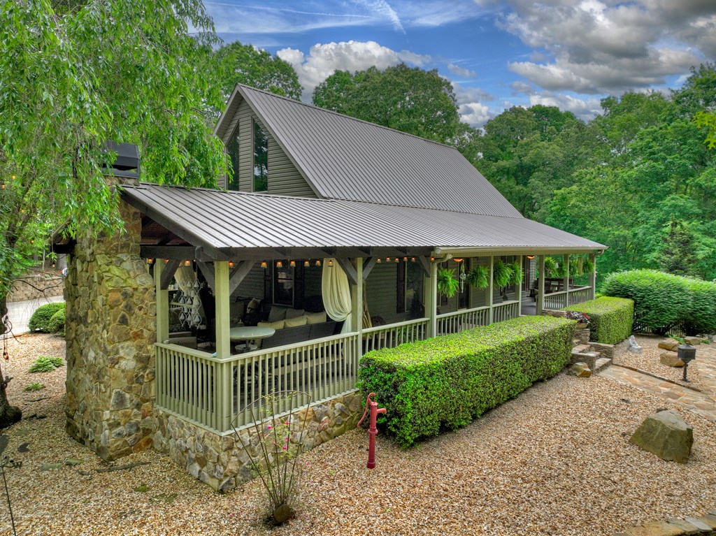 270 Stone Lane Blue Ridge, GA 30513 - Photo 30 of 70 a view of house with a big yard and a garden