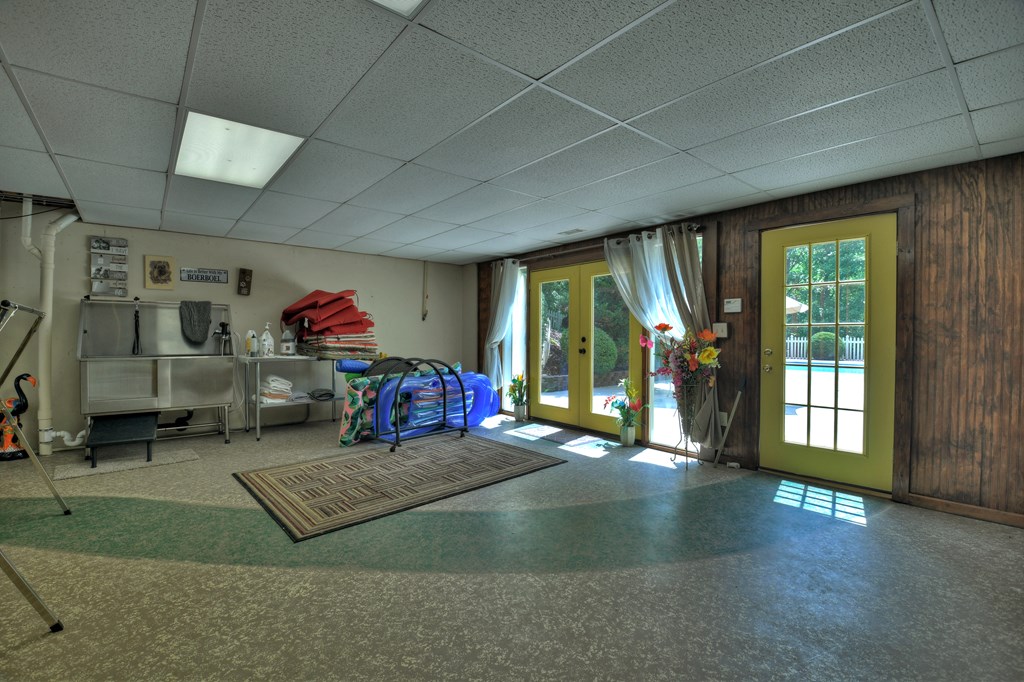 270 Stone Lane Blue Ridge, GA 30513 - Photo 38 of 70 a living room with furniture and a floor to ceiling window