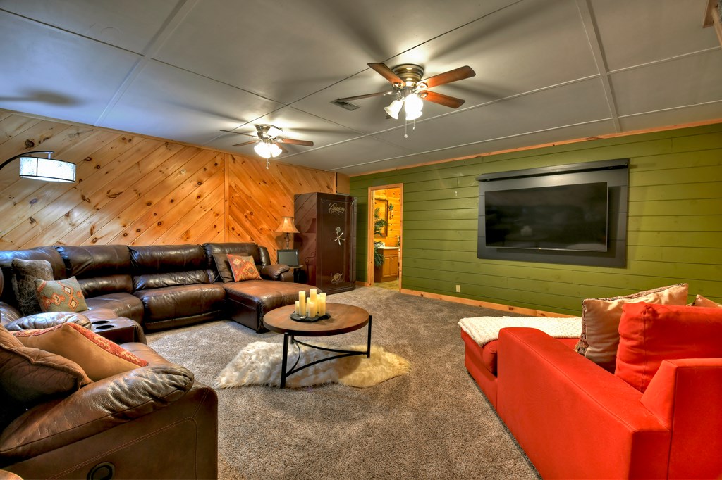 270 Stone Lane Blue Ridge, GA 30513 - Photo 41 of 70 a living room with furniture and a flat screen tv