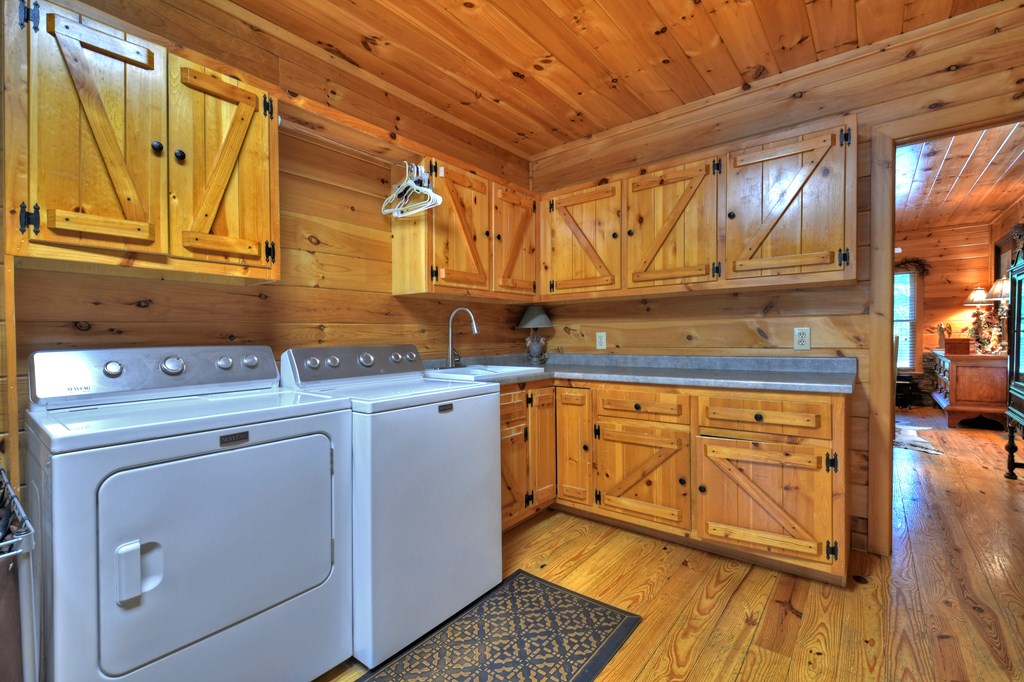 270 Stone Lane Blue Ridge, GA 30513 - Photo 54 of 70 a view of a storage and utility room with wooden floor