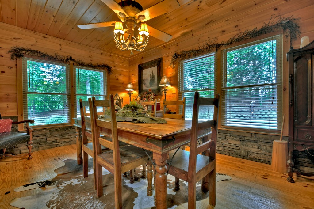270 Stone Lane Blue Ridge, GA 30513 - Photo 58 of 70 a view of a dining room with furniture window and outside view